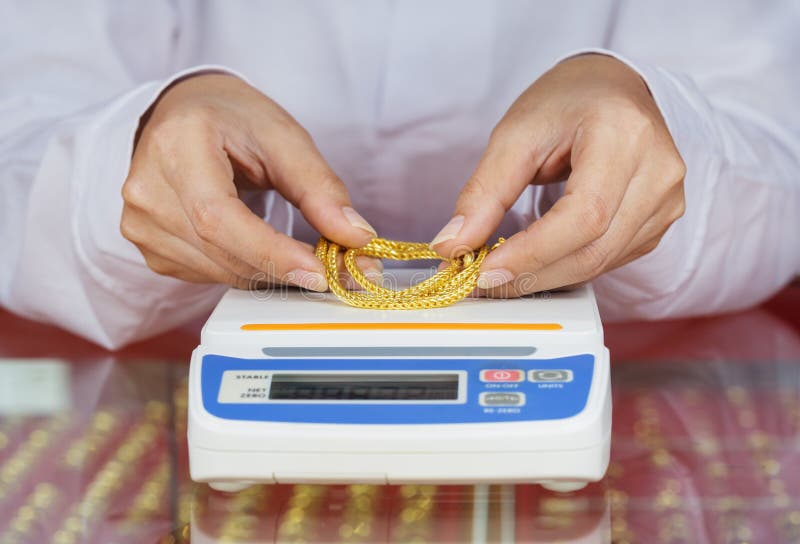 Scales Weighing Coins