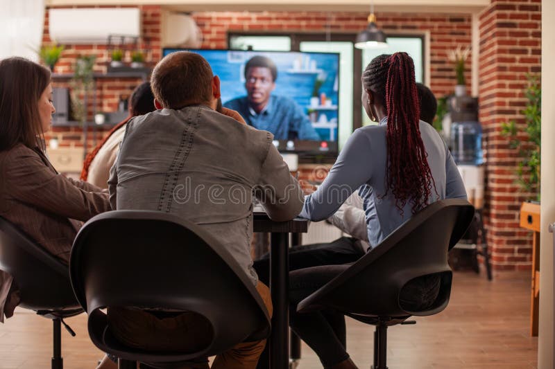 Digital screen displays man on video call stock image