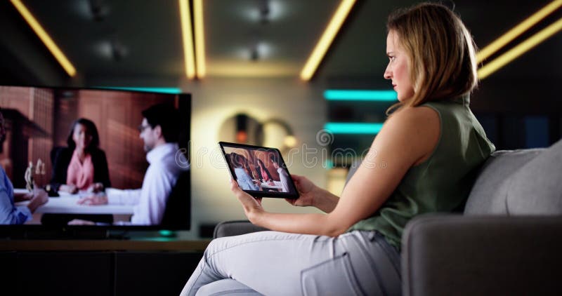 Digital Streaming: Young Female Using Tablet stock images