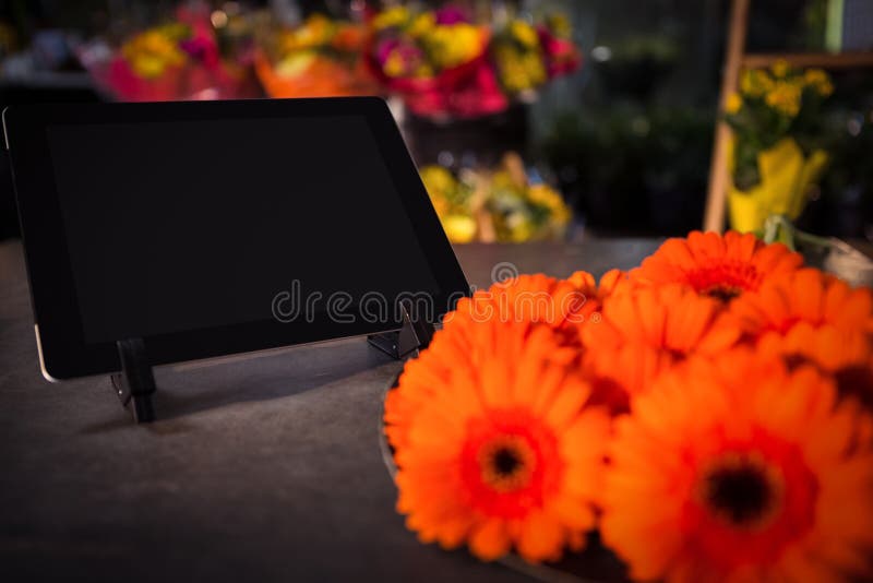 Digital Tablet at Flower Shop Stock Image Image of indoors, bunch