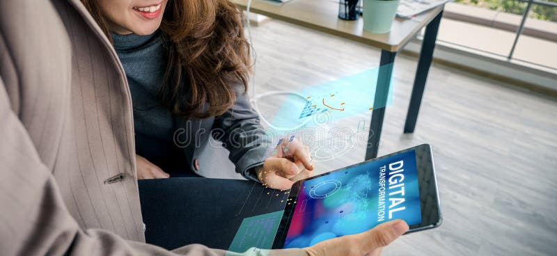 Digital transformation concept,asian business woman learning from tablet about digitization transform analog to digital in stock photography
