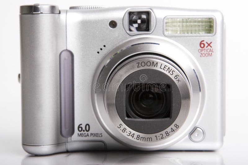 Black-white digital camera on white open front face. Black-white digital camera on white open front face