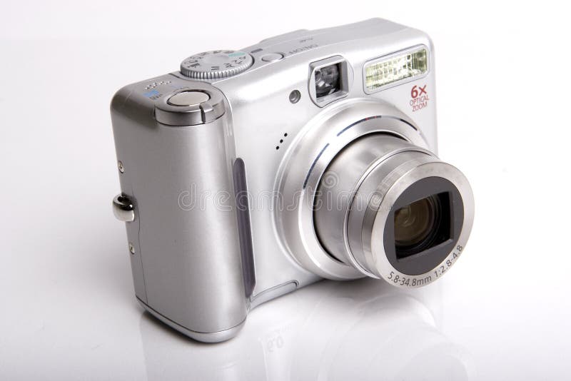 Black-white digital camera on white open. Black-white digital camera on white open