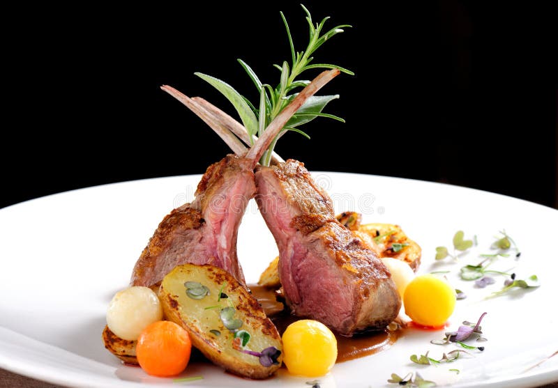 Fine dining, roasted Lamb chops with potato, rosemary and vegetable sauce. Fine dining, roasted Lamb chops with potato, rosemary and vegetable sauce