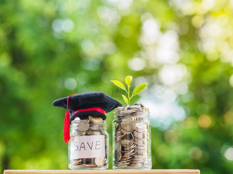 Saving money for education concept. Coins in glass jar with graduate hat on blur background. Saving money for education concept. Coins in glass jar with graduate hat on blur background.