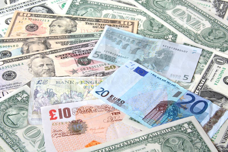 A texture of world currencies: U.S. dollars, pounds and euros. Banknotes. A texture of world currencies: U.S. dollars, pounds and euros. Banknotes