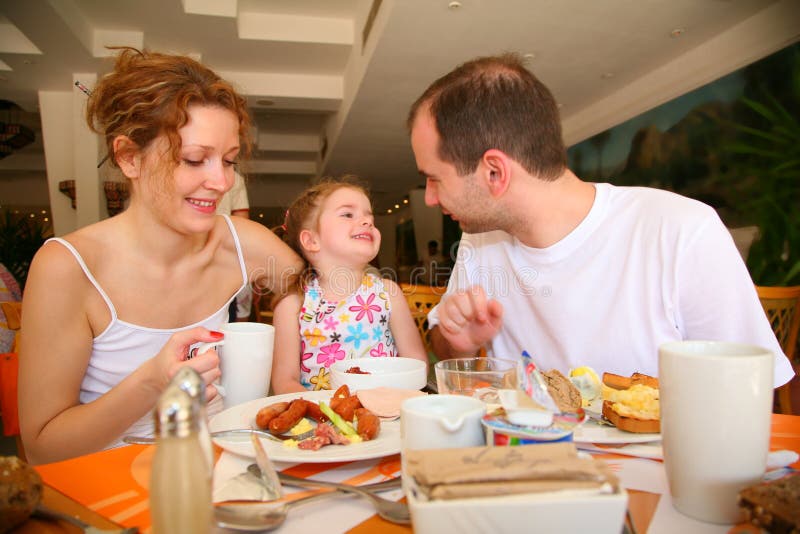 Dining family stock image. Image of eating, lifestyles 2525505