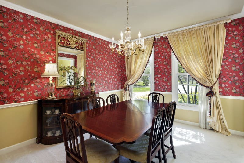Dining room with red walls stock photo. Image of design 12627114