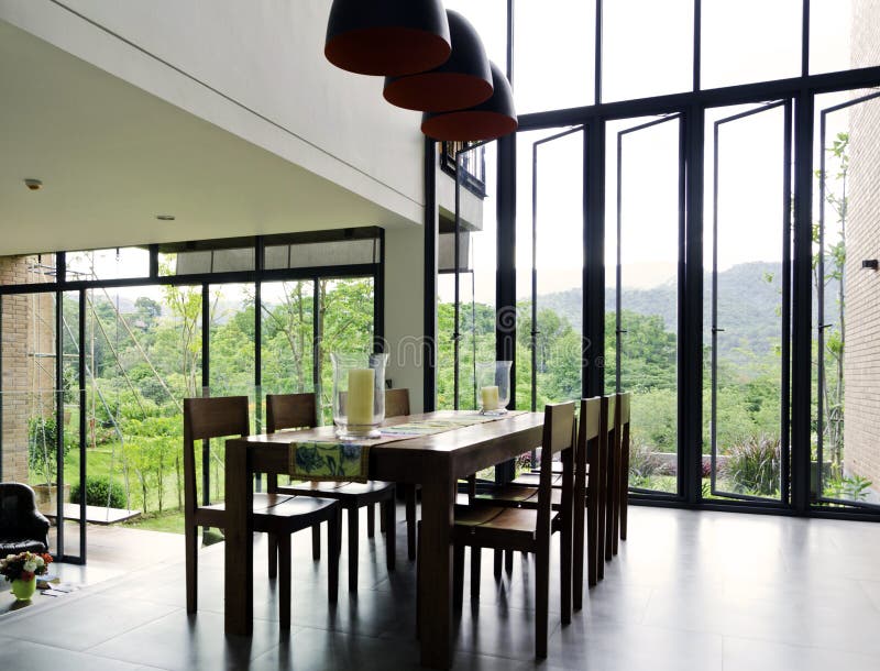 Dining room interior with wooden table and chairs