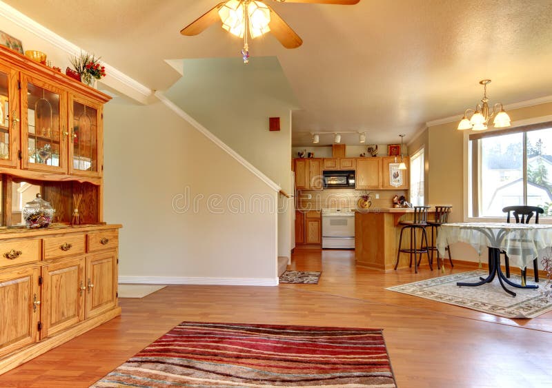 Dining Room and Large Area Near Kitchen Home Interior. Stock Image