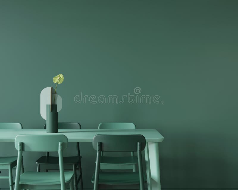 Dining room in monochrome green with a large table, chairs and a vase