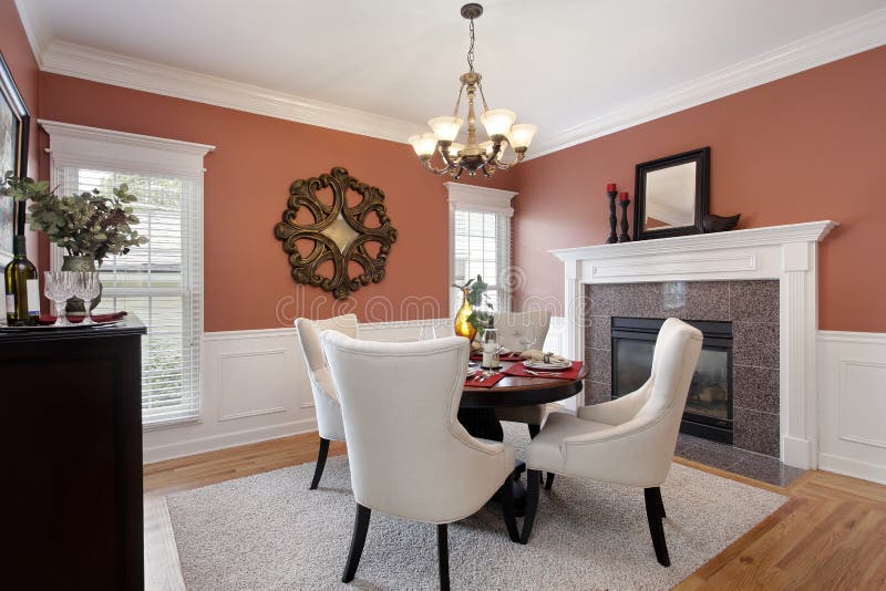 Dining Room with Orange Walls Stock Photo Image of real, furnishings
