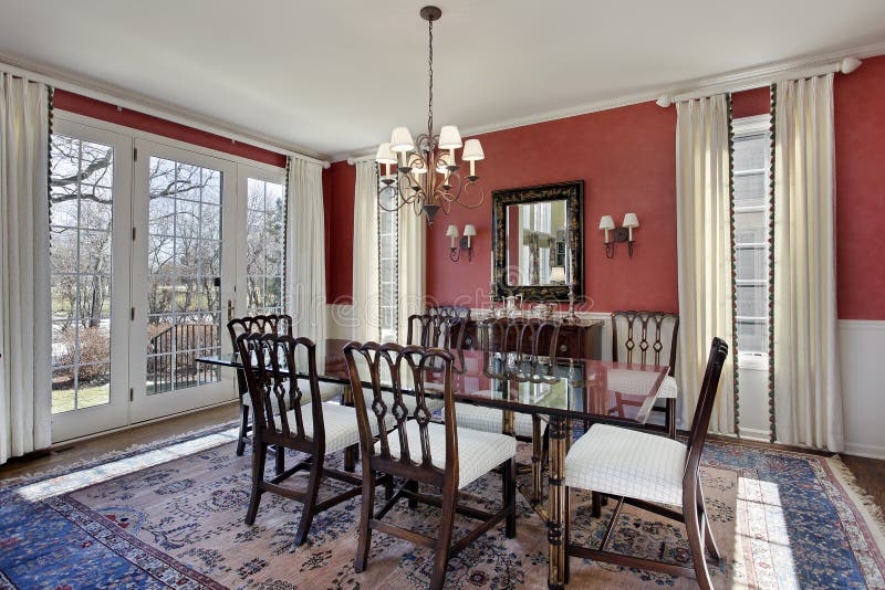 Dining room with red walls stock image. Image of interior - 22336745