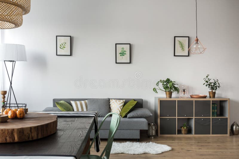 Dining room with sofa stock image. Image of comfort, furniture - 84360503