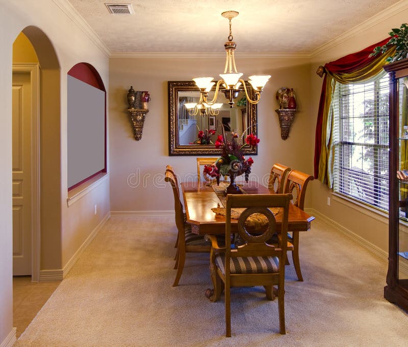 Dining room with red walls stock photo. Image of residential 12627114
