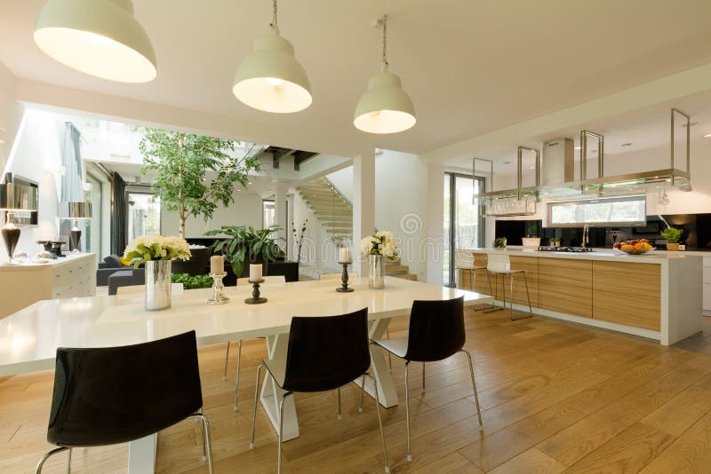 Dining Room with White Table and Black Chairs Stock Image Image of