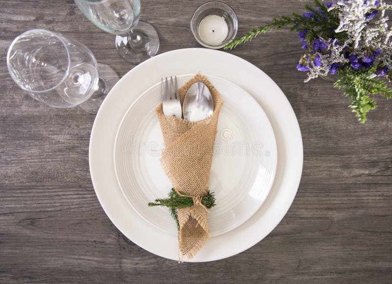 Dinner Plate Setting Decoration on Wood Table Top View Stock Photo