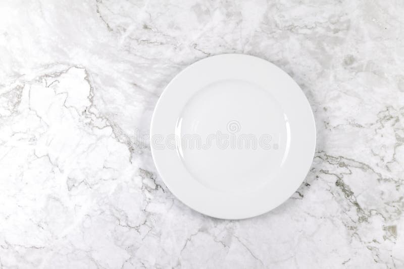 Dinner Plate on a White and Grey Marble Surface Stock Image Image of