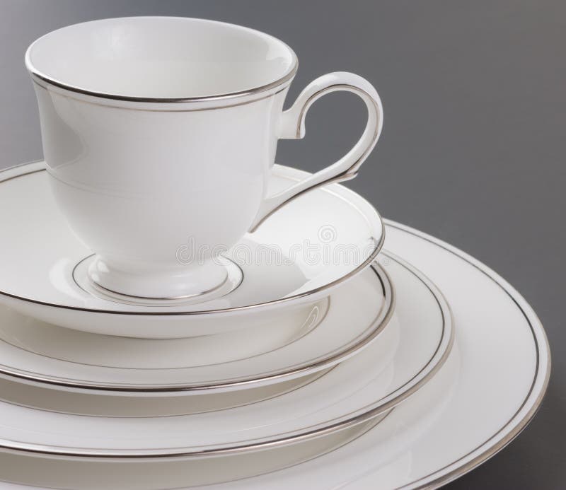 Dinner set of beautiful white, gold rim and cup. stock photos Dinner set of beautiful white, gold rim and cup. stock photos