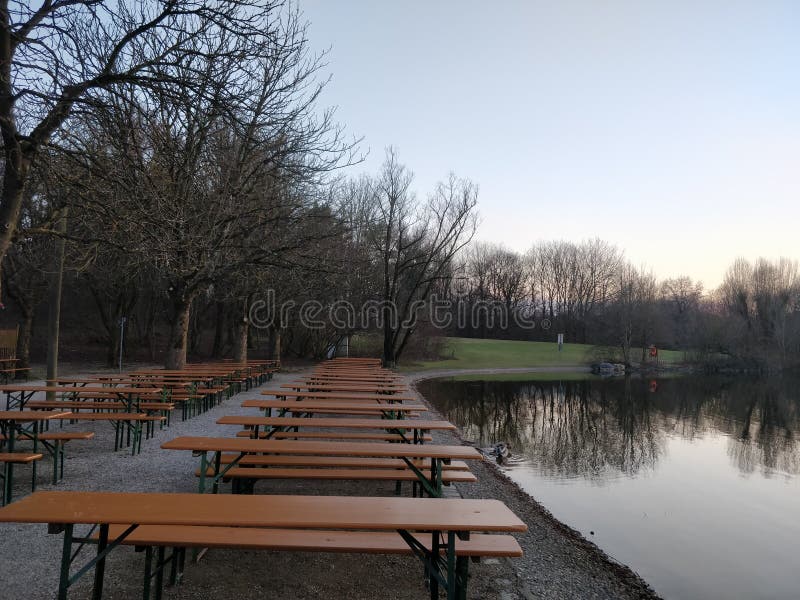 Dinning Tables along a river bank stock photo Dinning Tables along a river bank stock photo