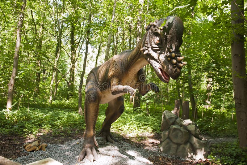 Close-up of the dinosaur in the forest.