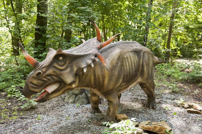 Close-up of the dinosaur in the forest.