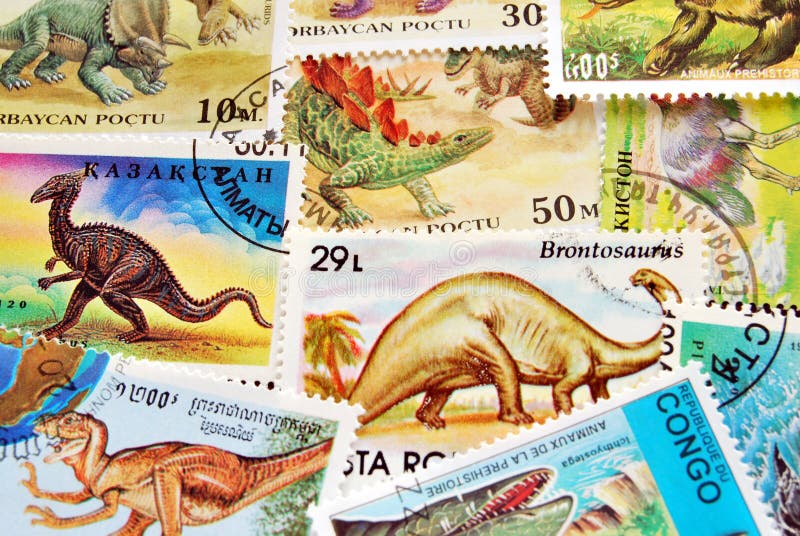 Close up of dinosaurs stamps horizontal background. Close up of dinosaurs stamps horizontal background