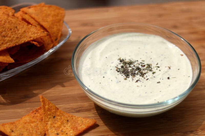 Dip and Tortilla Chips stock image. Image of herb, delicious 132384583