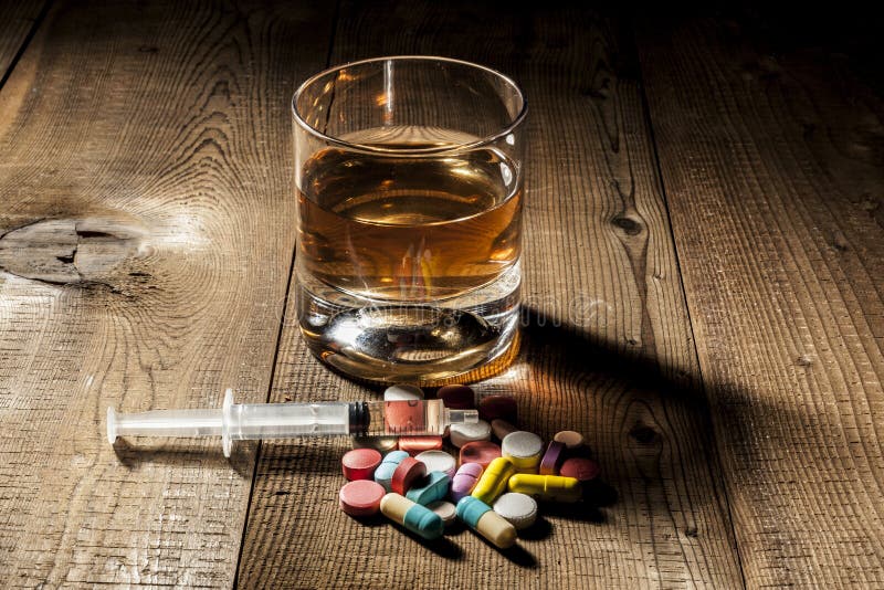 Dipendenza delle pillole e dell'alcool
