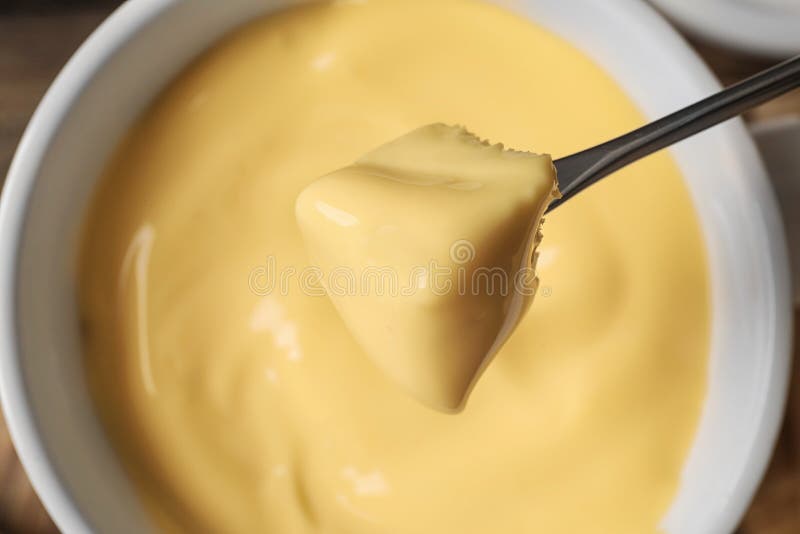 Dipping Bread into Tasty Cheese Fondue Stock Image Image of cream