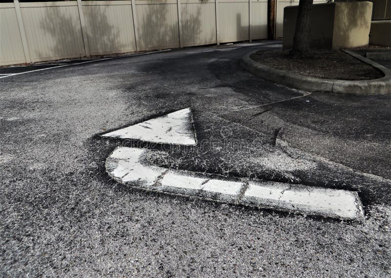 Directional Arrow in Parking Lot Stock Image Image of gray, surface