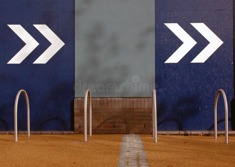 https://thumbs.dreamstime.com/b/directional-arrows-blue-coloured-wall-pointing-way-to-go-33793493.jpg