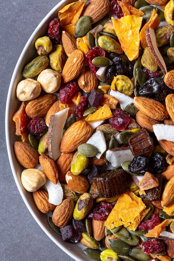 Variety of dried fruits and nuts on plate