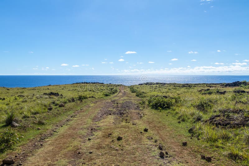 Dirt Road leading to the ocean - Easter Island, Chile royalty free stock photo Dirt Road leading to the ocean - Easter Island, Chile royalty free stock photo