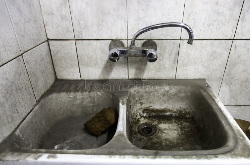 Dirty bathroom unsanitary stock image. Image of washbasin 218769883