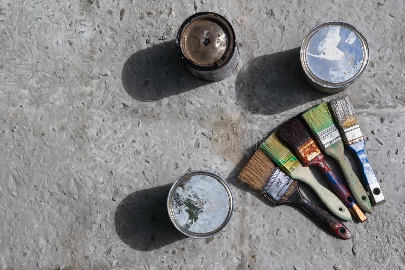 Dirty Brushes and Paint Cans on Concrete. Stock Image Image of object