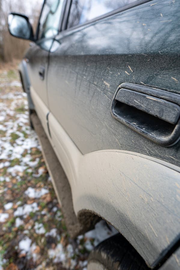 Dirty car side. Splash and texture of mud on a car stock images