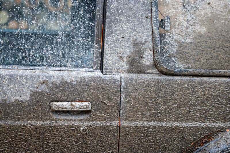 Dirty car side. Splash and texture of mud on a car. Mad splattered 4x4 SUV stock photo