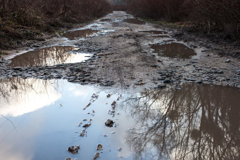 Dirty country road stock photos