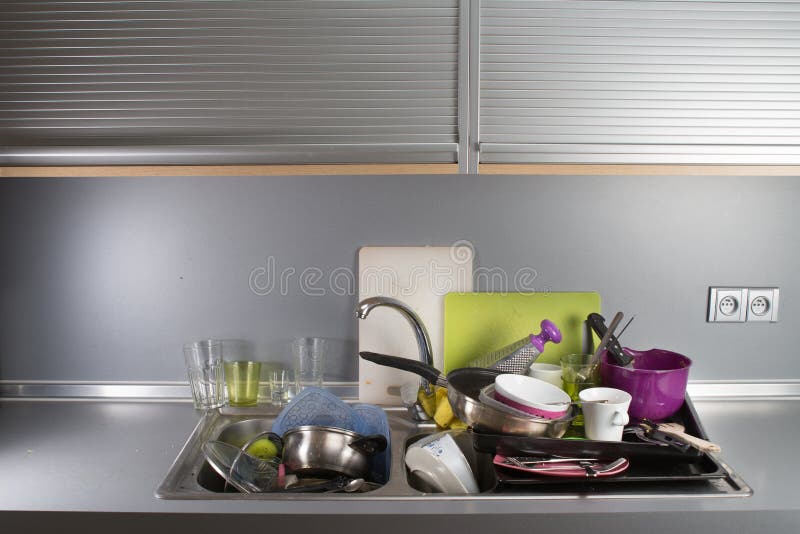 Dirty Dishes in a Kitchen Sink. Stock Photo Image of kitchen, smelly