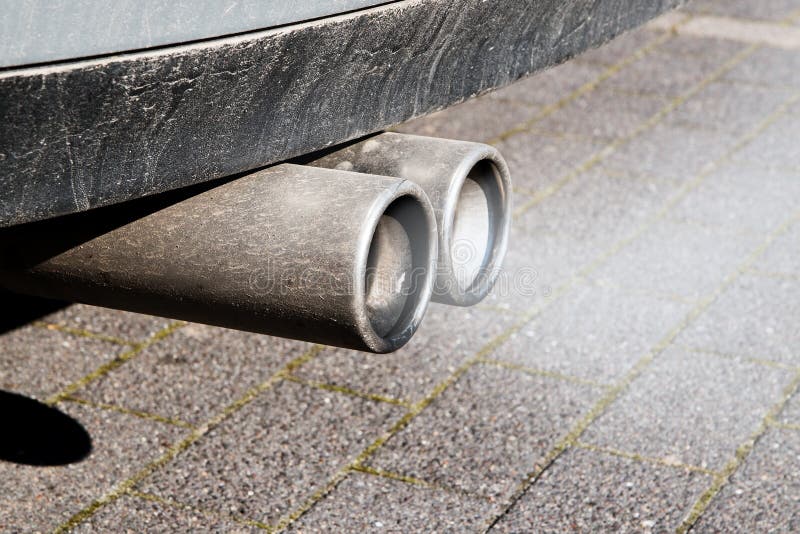 Dirty Dual Exhaust Pipes of a Car, Emissions Test Stock Image - Image ...