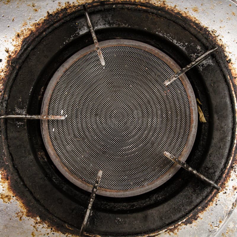 Dirty gas burner closeup stock photo. Image of closeup 58162720