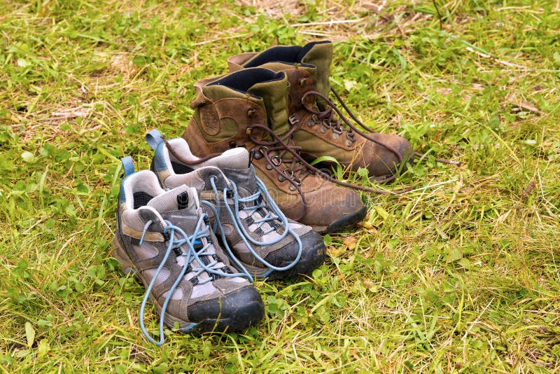 Dirty Hiking Boots on Wet Grass Stock Photo - Image of nature, outdoor ...