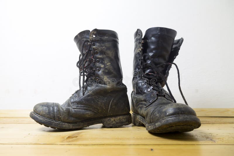 Dirty Military Or Hiking Boots On Wooden Background Stock Image - Image ...