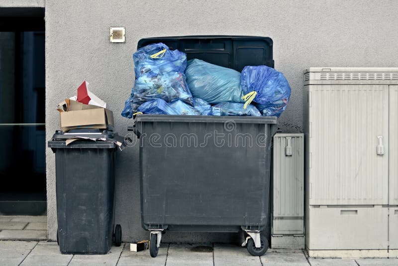 Dirty Public Trash Cans on the Pavement. Stock Image Image of social