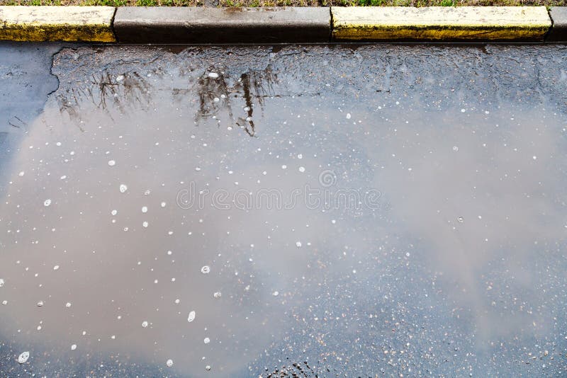 Dirty Puddle on Urban Streen in Rain Stock Image Image of rainy, rain