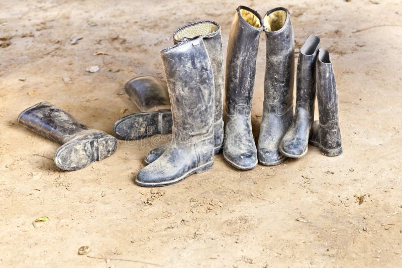 Dirty Riding Boots Standing at Muddy Ground Stock Image - Image of ...