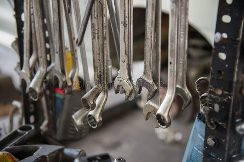 Dirty set of metal wrenches and tools various sizes