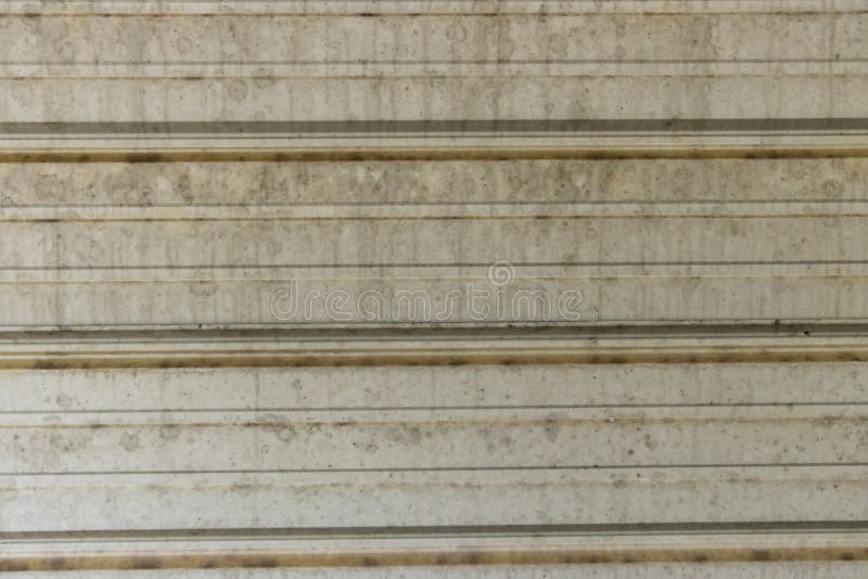Dirty side of steel building royalty free stock photography
