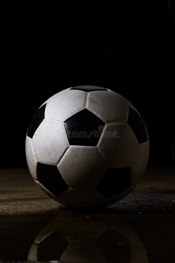 Dirty soccer ball stock photos
